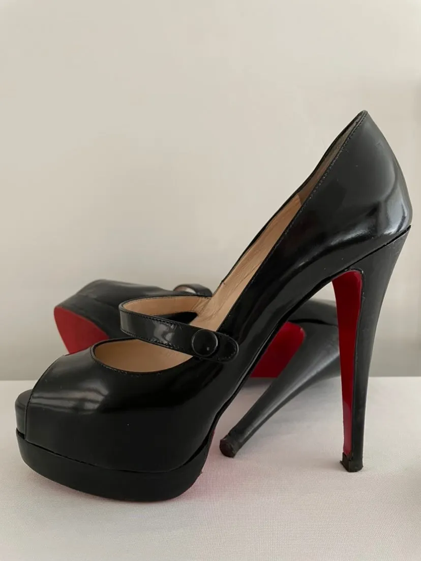 CHRISTIAN LOUBOUTIN
Black No Barre 130mm Patent Platform
Mary Jane Peep Toe Pumps