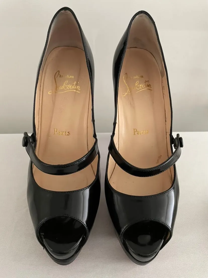 CHRISTIAN LOUBOUTIN
Black No Barre 130mm Patent Platform
Mary Jane Peep Toe Pumps